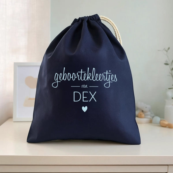 Bewaarzakje geboortekleertjes met naam