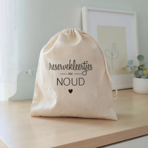 Bewaarzakje reservekleertjes met naam
